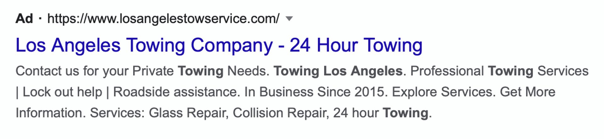 Google search text ad for towing