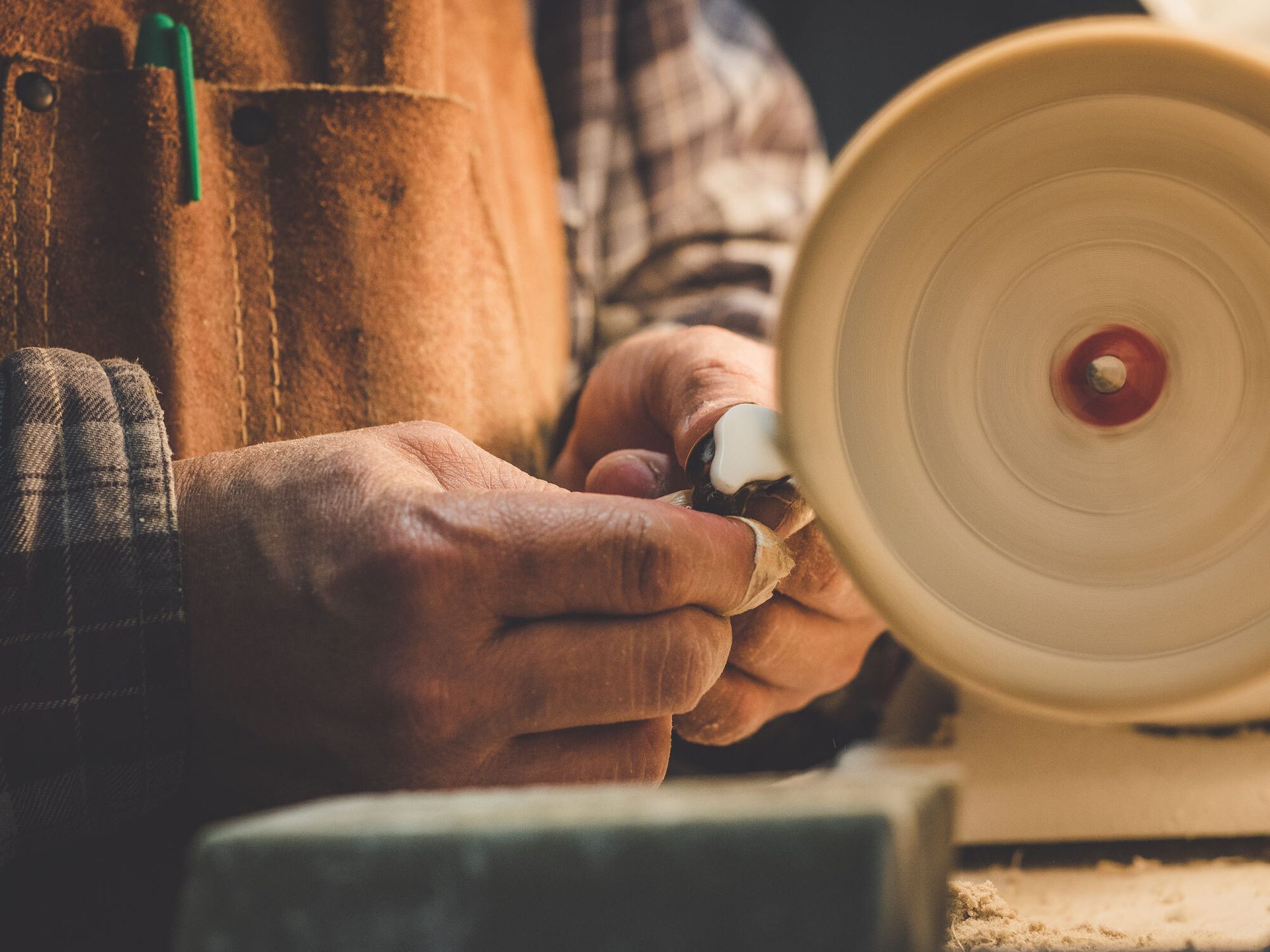 Hands polishing a customer Alclair earpiece